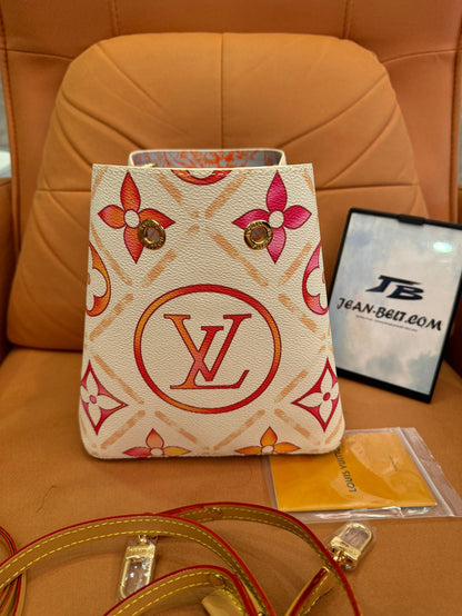 Bolso pequeño tipo cubo de la colección cápsula de verano de Louis Vuitton: estampado floral con monograma en rosa y naranja