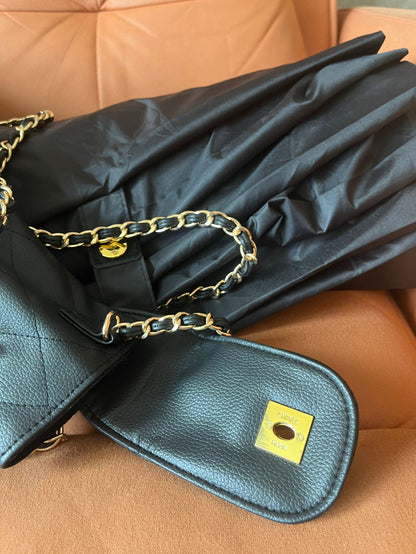 Paraguas plegable Chanel con estuche negro dorado