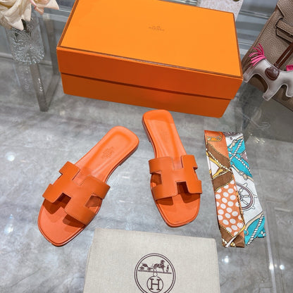Zapatilla de piel Hermes naranja Swift