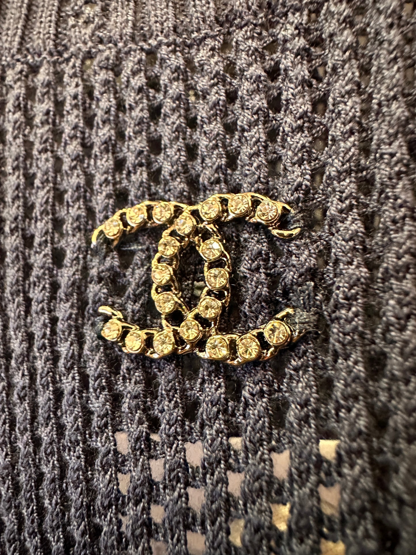 Top en tricot à manches courtes Chanel Camélia