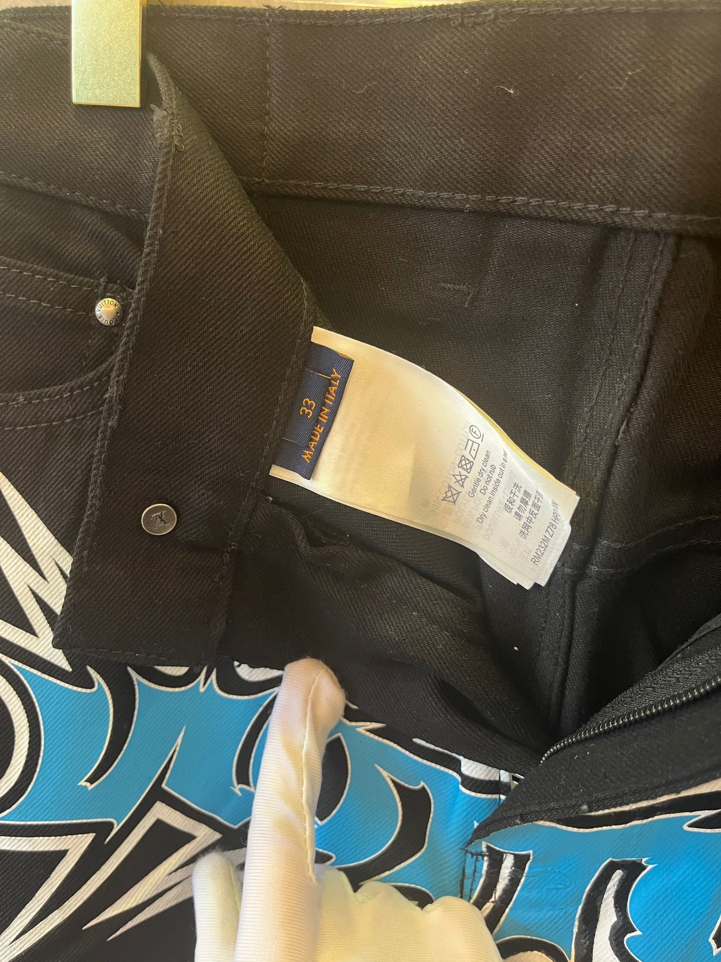 Calça jeans estampada de corrida Louis Vuitton