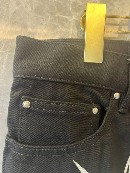 Calça jeans estampada de corrida Louis Vuitton