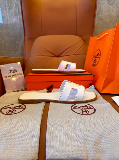 Sandalias Hermes naranjas y blancas