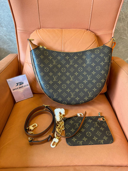 Bolsa hobo com alça Louis Vuitton