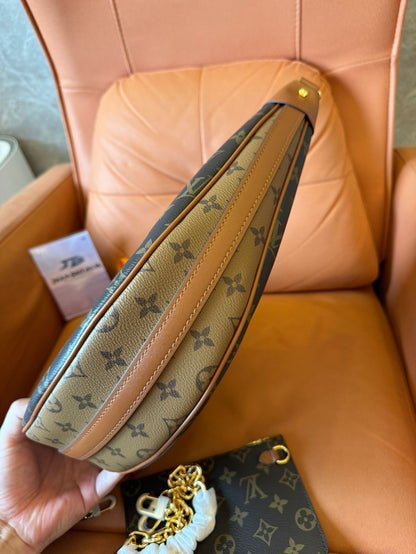 Bolsa hobo com alça Louis Vuitton