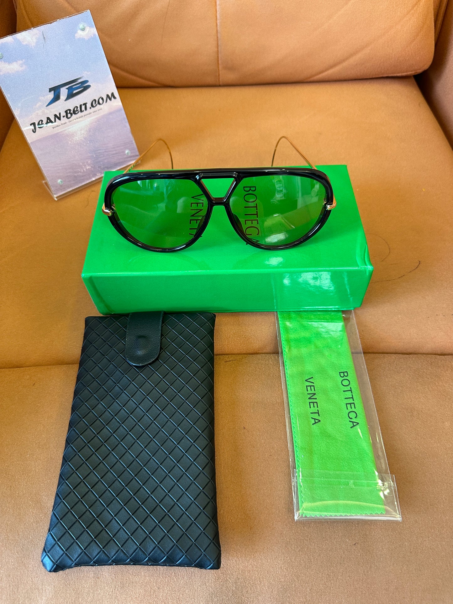Bottega Veneta BV1273S 001 Black Frame Sunglasses with Gold Metal Temples and Amber Gradient Lenses