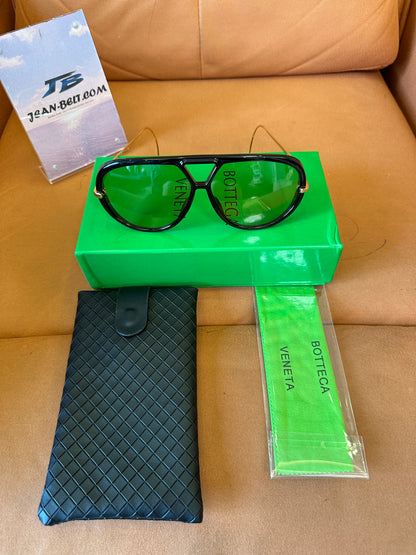 Bottega Veneta BV1273S 001 Black Frame Sunglasses with Gold Metal Temples and Amber Gradient Lenses
