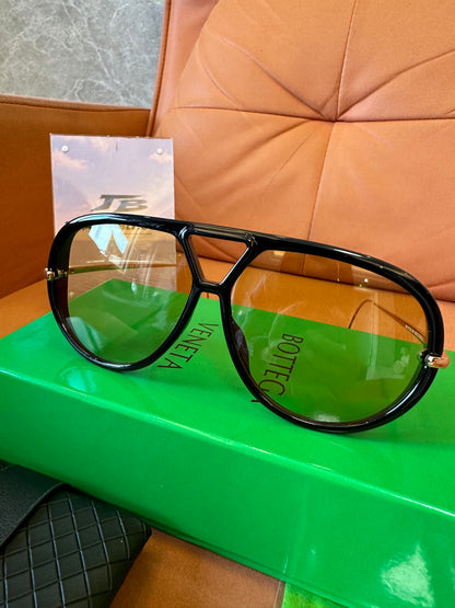 Bottega Veneta BV1273S 001 Black Frame Sunglasses with Gold Metal Temples and Amber Gradient Lenses