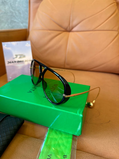 Bottega Veneta BV1273S 001 Black Frame Sunglasses with Gold Metal Temples and Amber Gradient Lenses