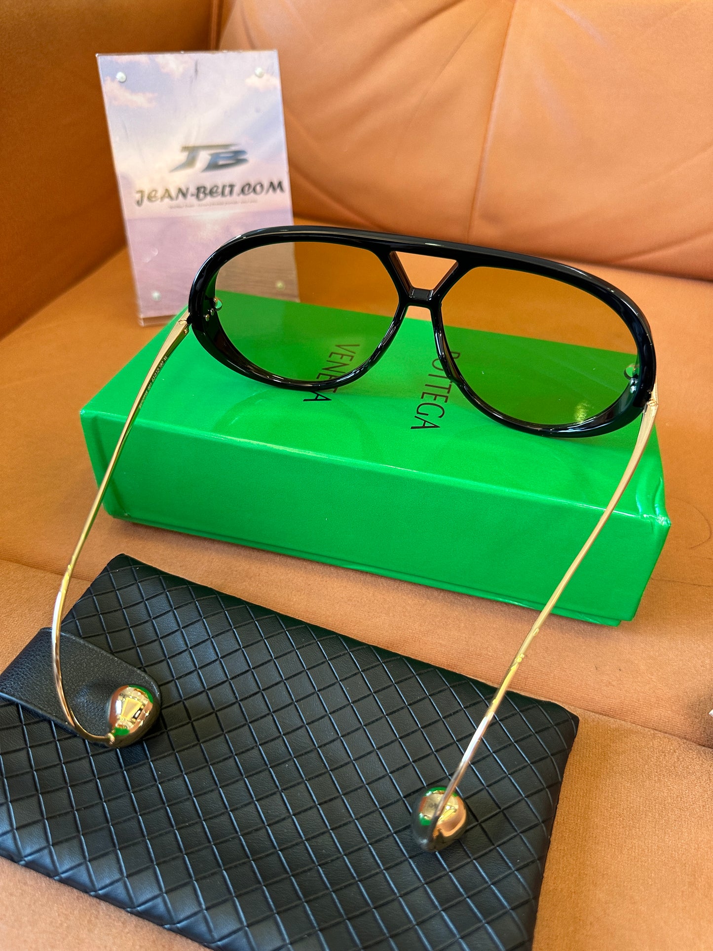 Bottega Veneta BV1273S 001 Black Frame Sunglasses with Gold Metal Temples and Amber Gradient Lenses