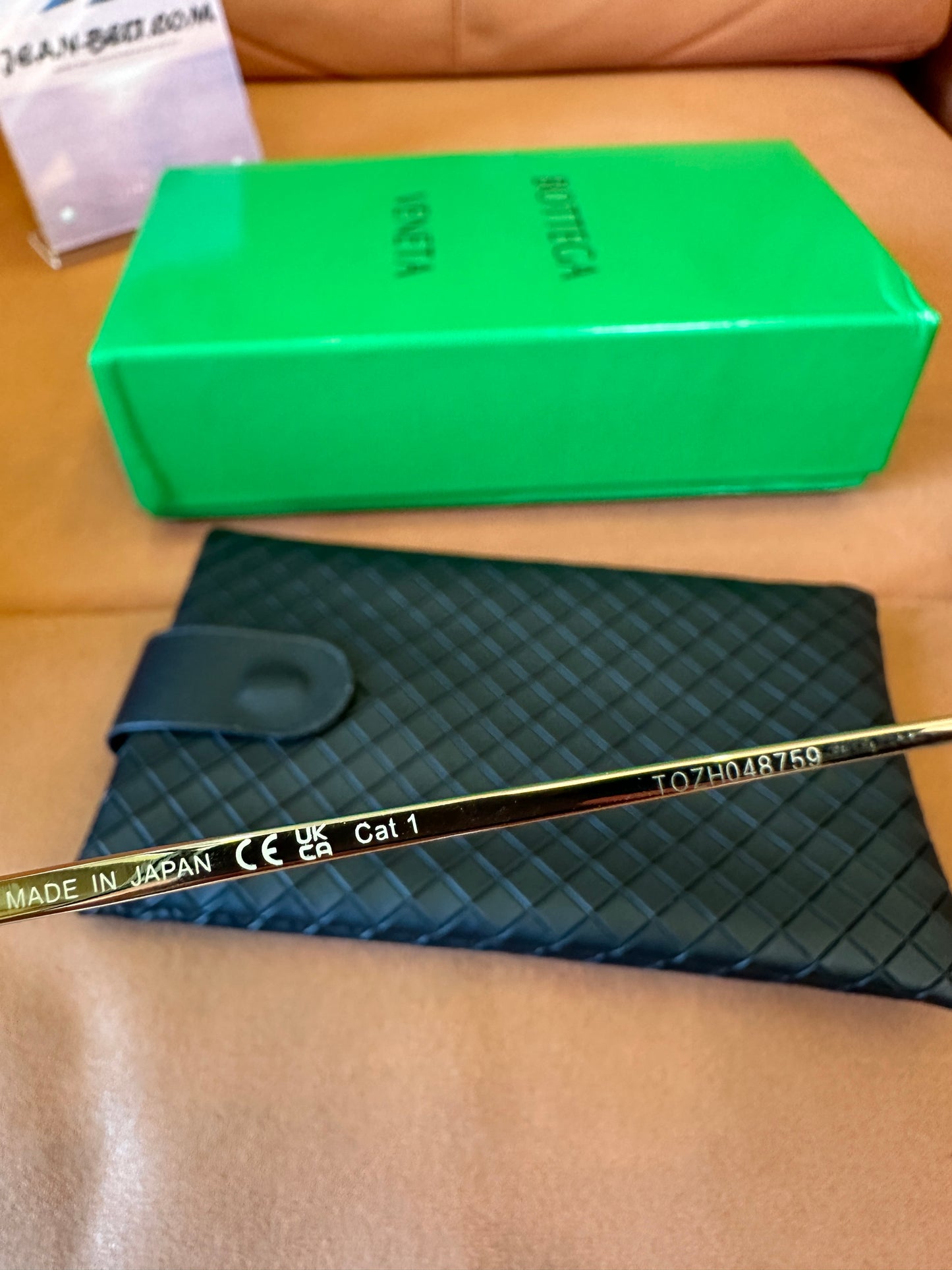 Bottega Veneta BV1273S 001 Black Frame Sunglasses with Gold Metal Temples and Amber Gradient Lenses