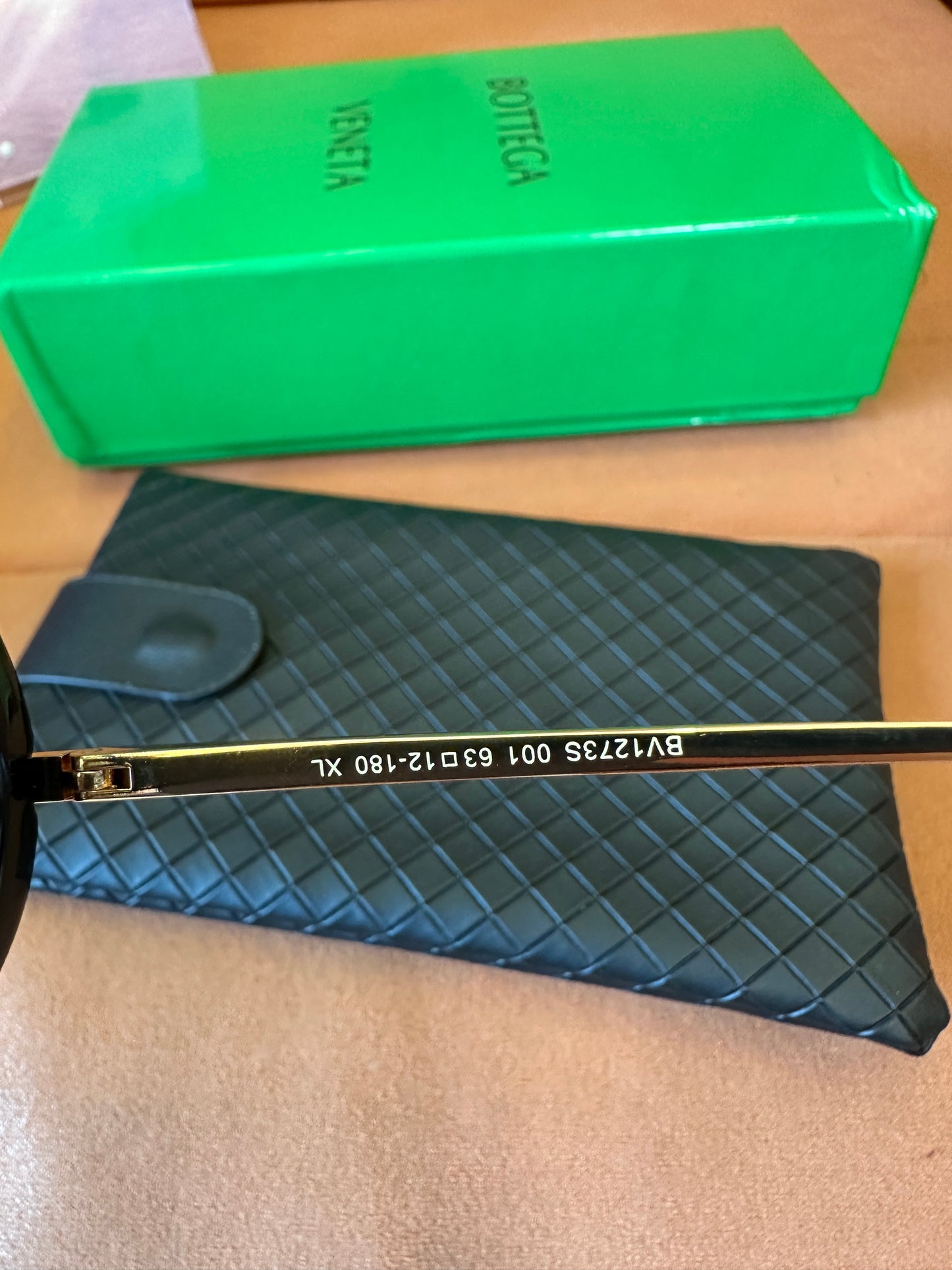 Bottega Veneta BV1273S 001 Black Frame Sunglasses with Gold Metal Temples and Amber Gradient Lenses