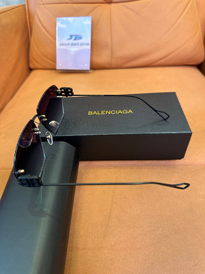 Balenciaga BB0174Q 007T Rimless Sunglasses – Black Studded Shield Sesign