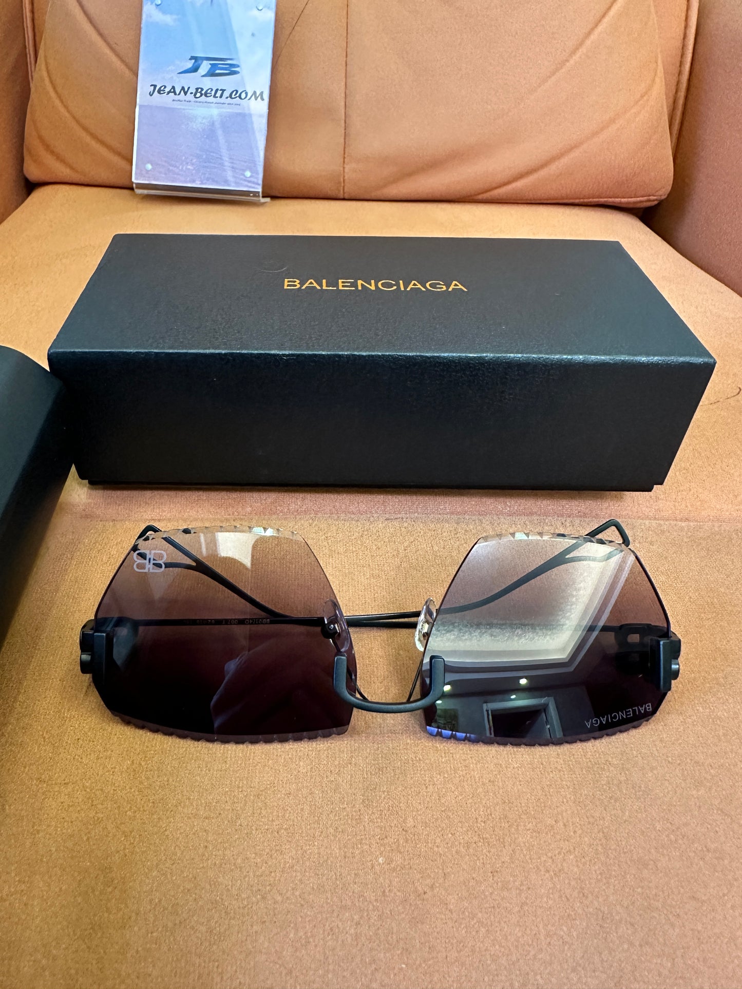 Balenciaga BB0174Q 007T Rimless Sunglasses – Black Studded Shield Sesign
