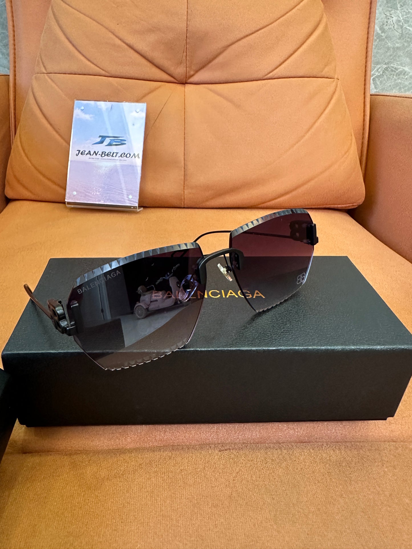 Balenciaga BB0174Q 007T Rimless Sunglasses – Black Studded Shield Sesign