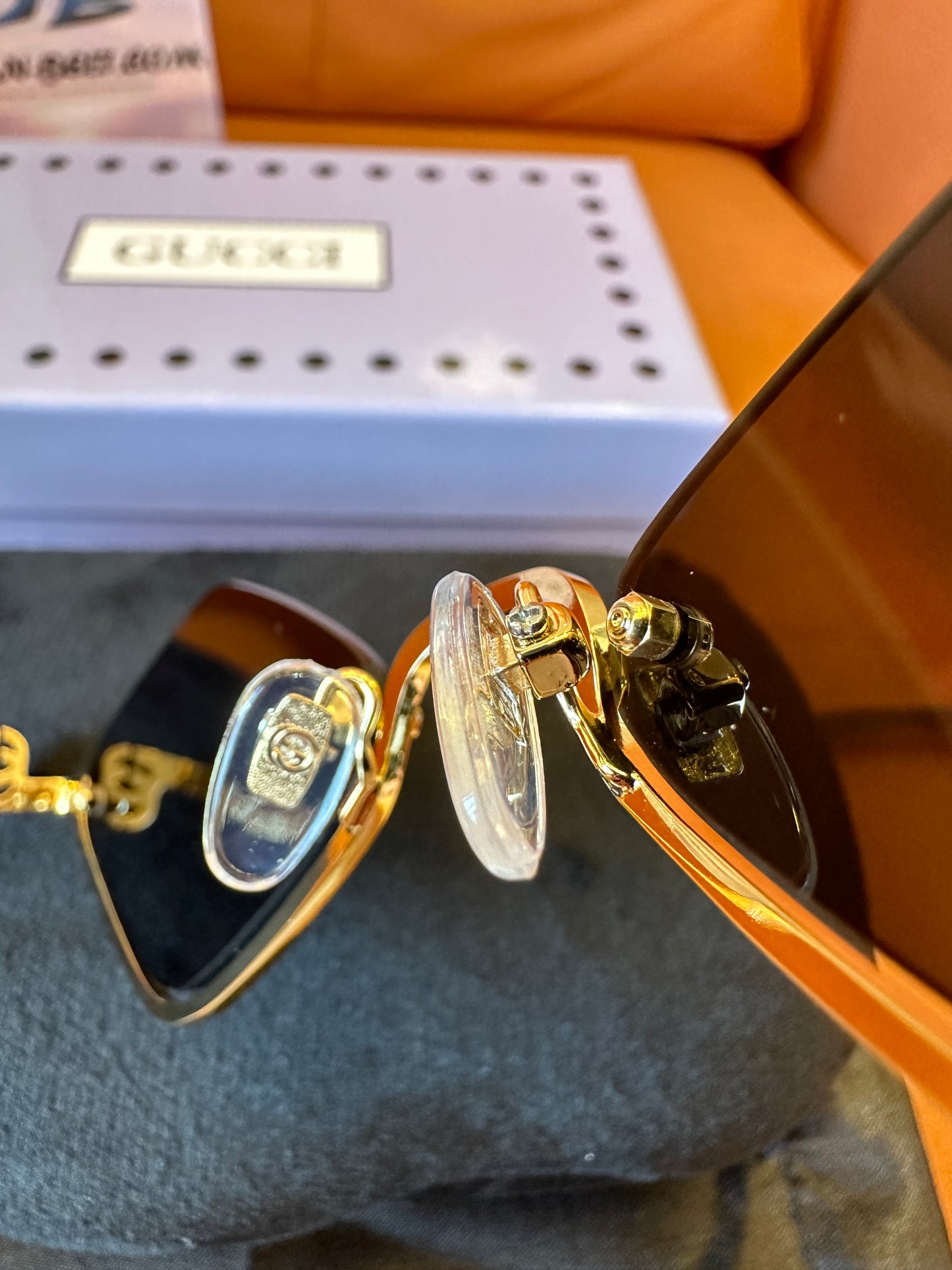 Gucci GG1604S 001 Rimless Geometric Sunglasses