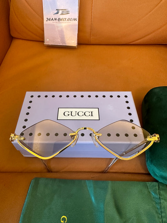 Óculos de Sol Geométricos sem Aros Gucci GG1604S 004