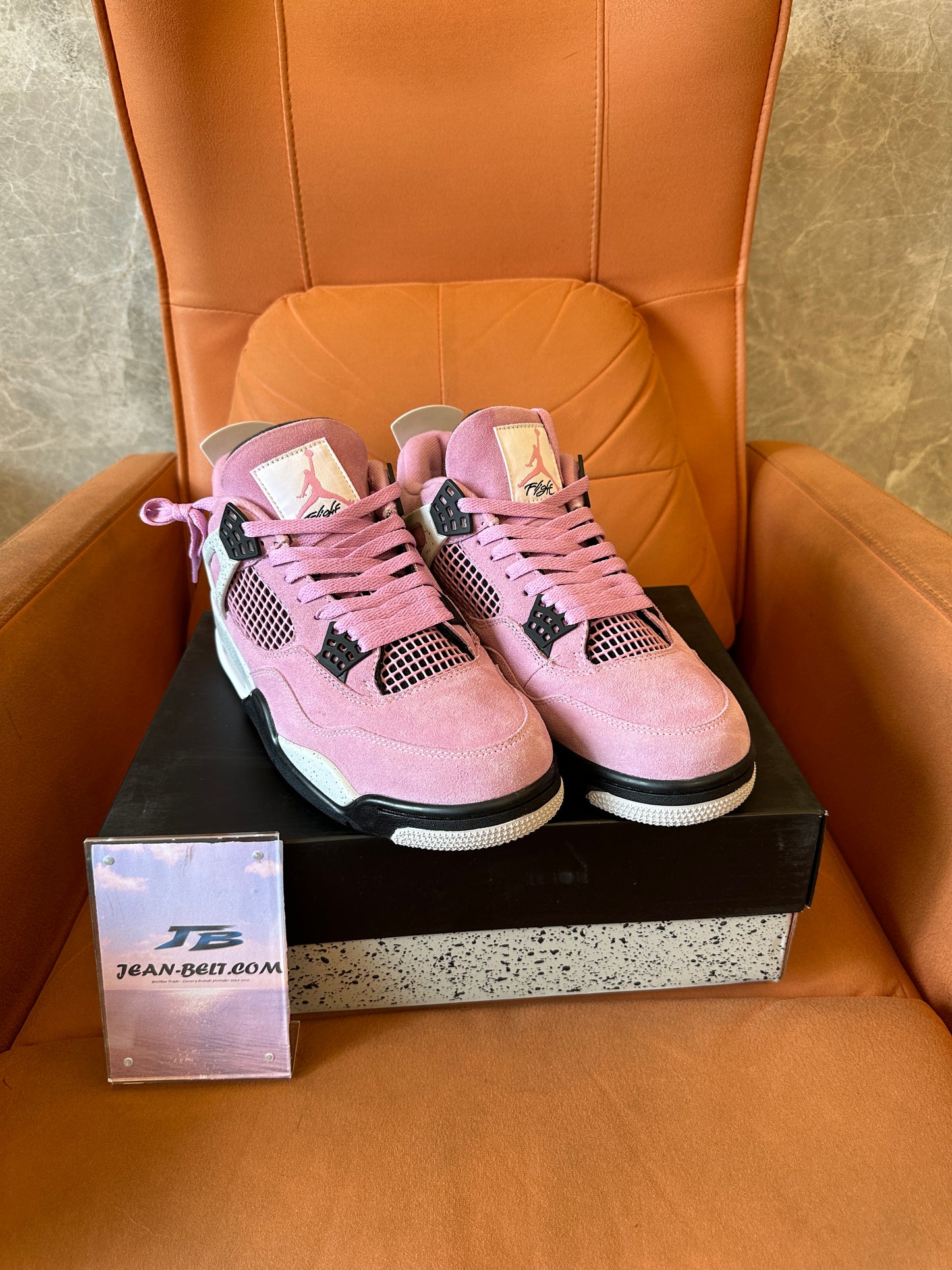 Air Jordan 4 Retro Pink Suede Sneakers