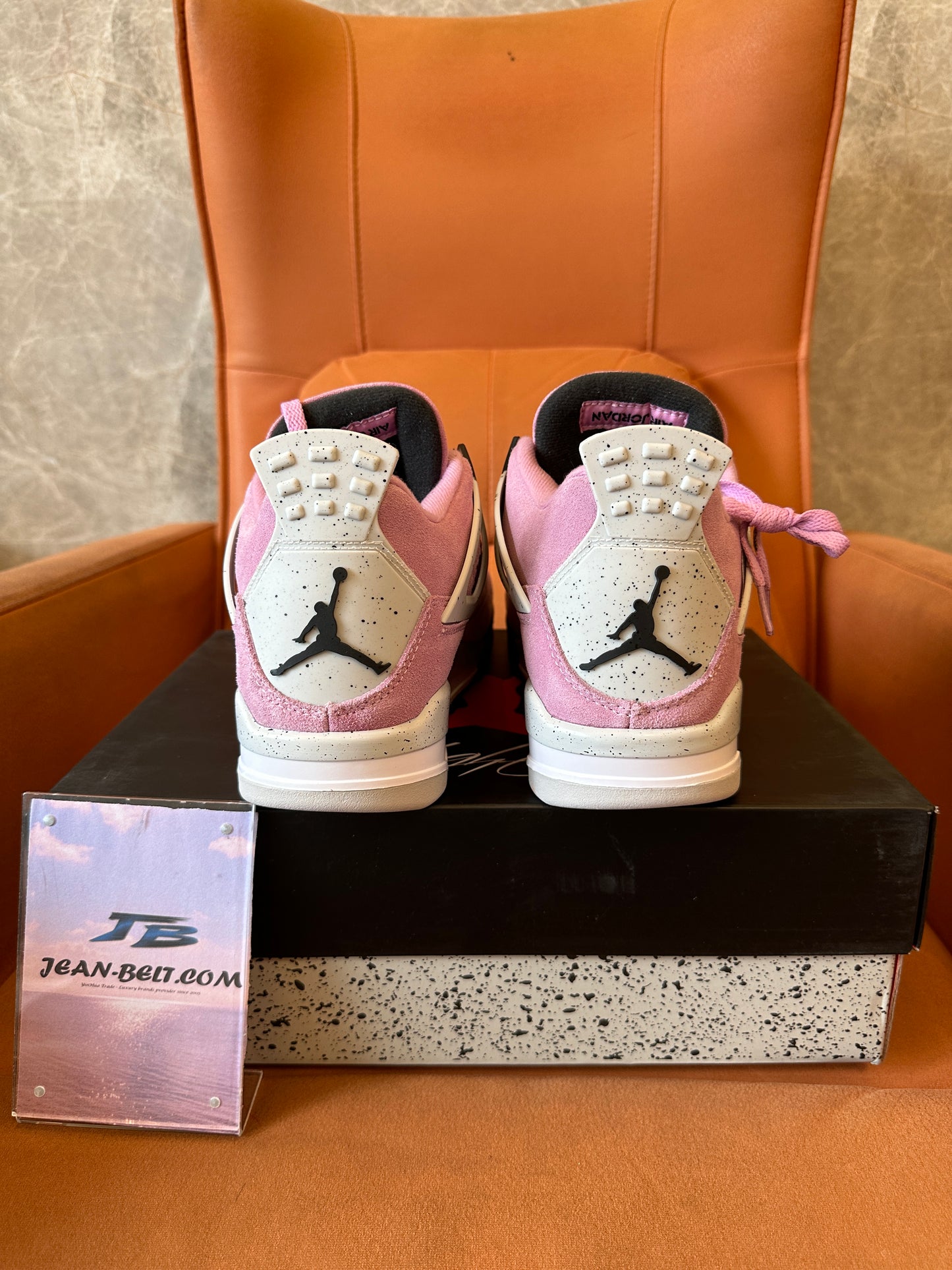 Air Jordan 4 Retro Pink Suede Sneakers
