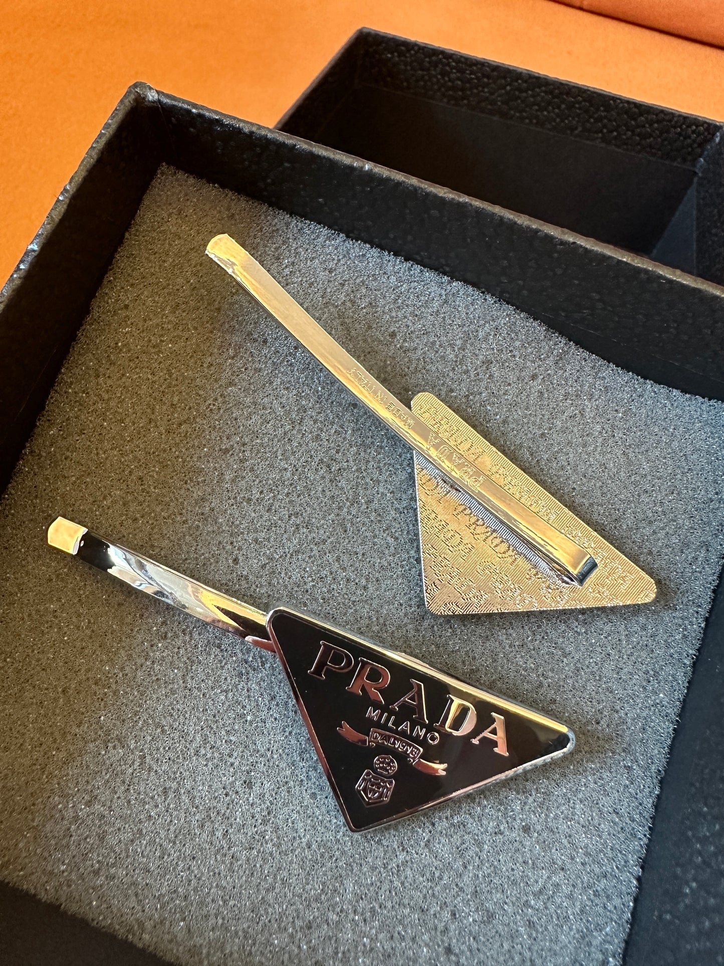 Prada Triangle Logo Hair Clip