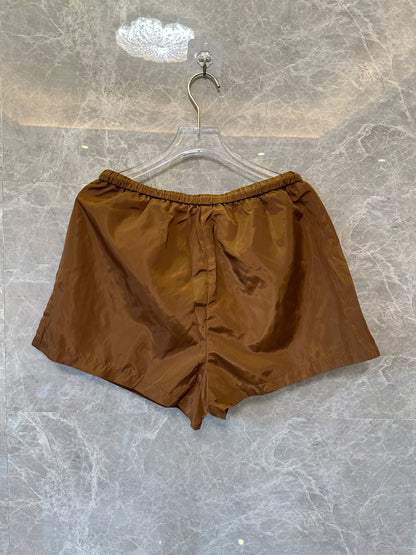 Calções Miu Miu castanhos de nylon com cordão