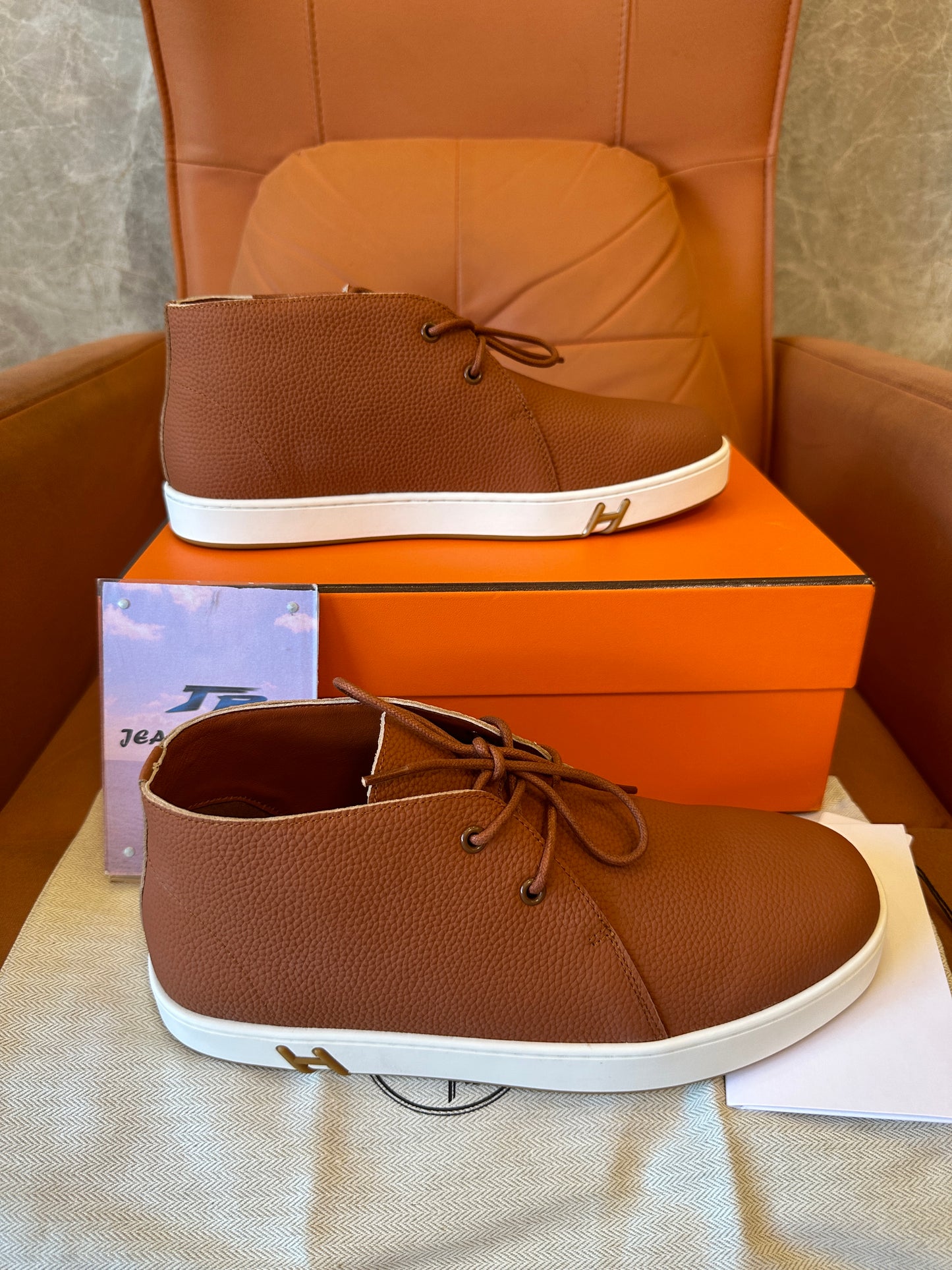 Hermès Togo leather “H” Chukka sneaker in marron