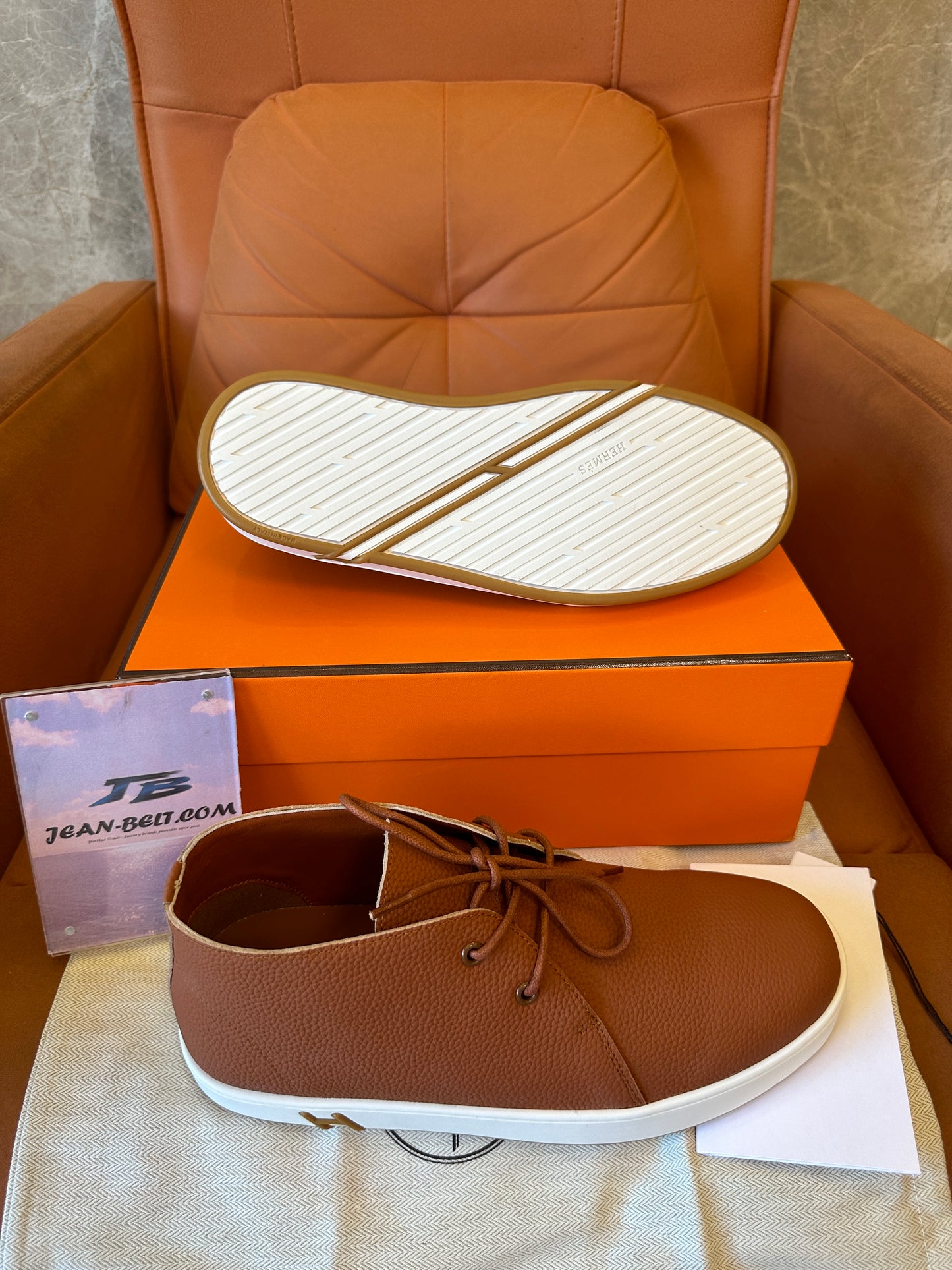 Hermès Togo leather “H” Chukka sneaker in marron