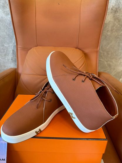 Hermès Togo leather “H” Chukka sneaker in marron