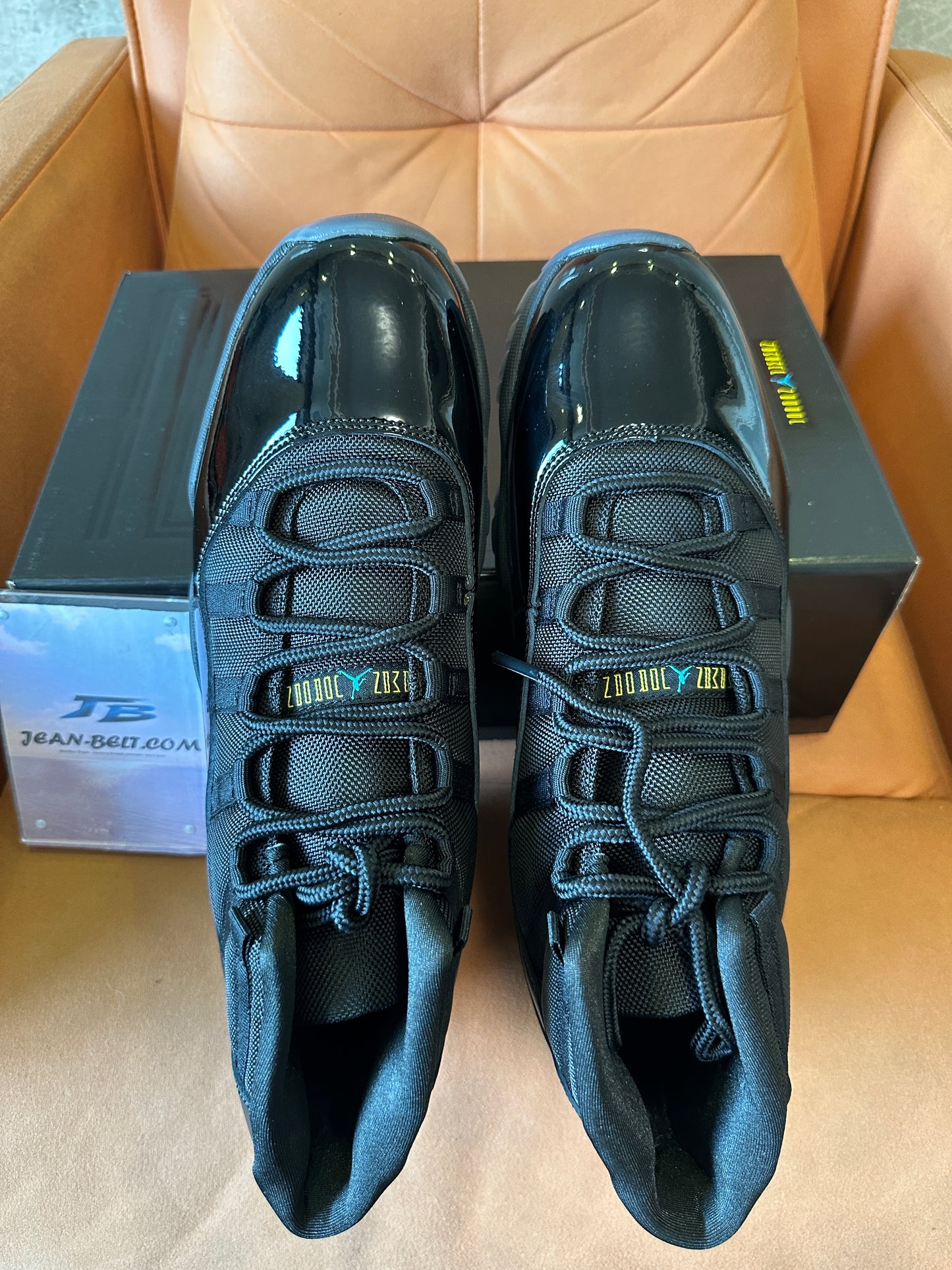 Air Jordan 11 Retro "Cap and Gown" Black Patent Leather Basketball Sneakers