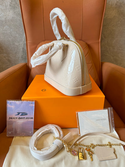 Louis Vuitton White Monogram Embossed Alma Handbag