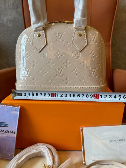 Louis Vuitton White Monogram Embossed Alma Handbag