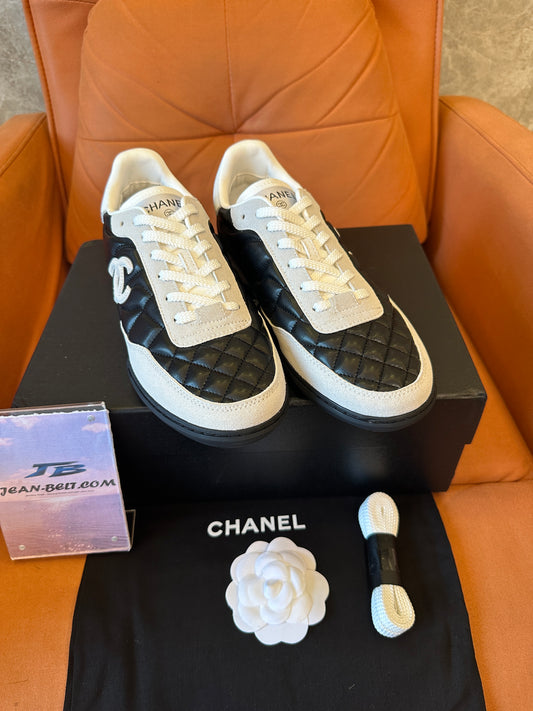 Chanel Quilted Black White Low Top Sneakers
