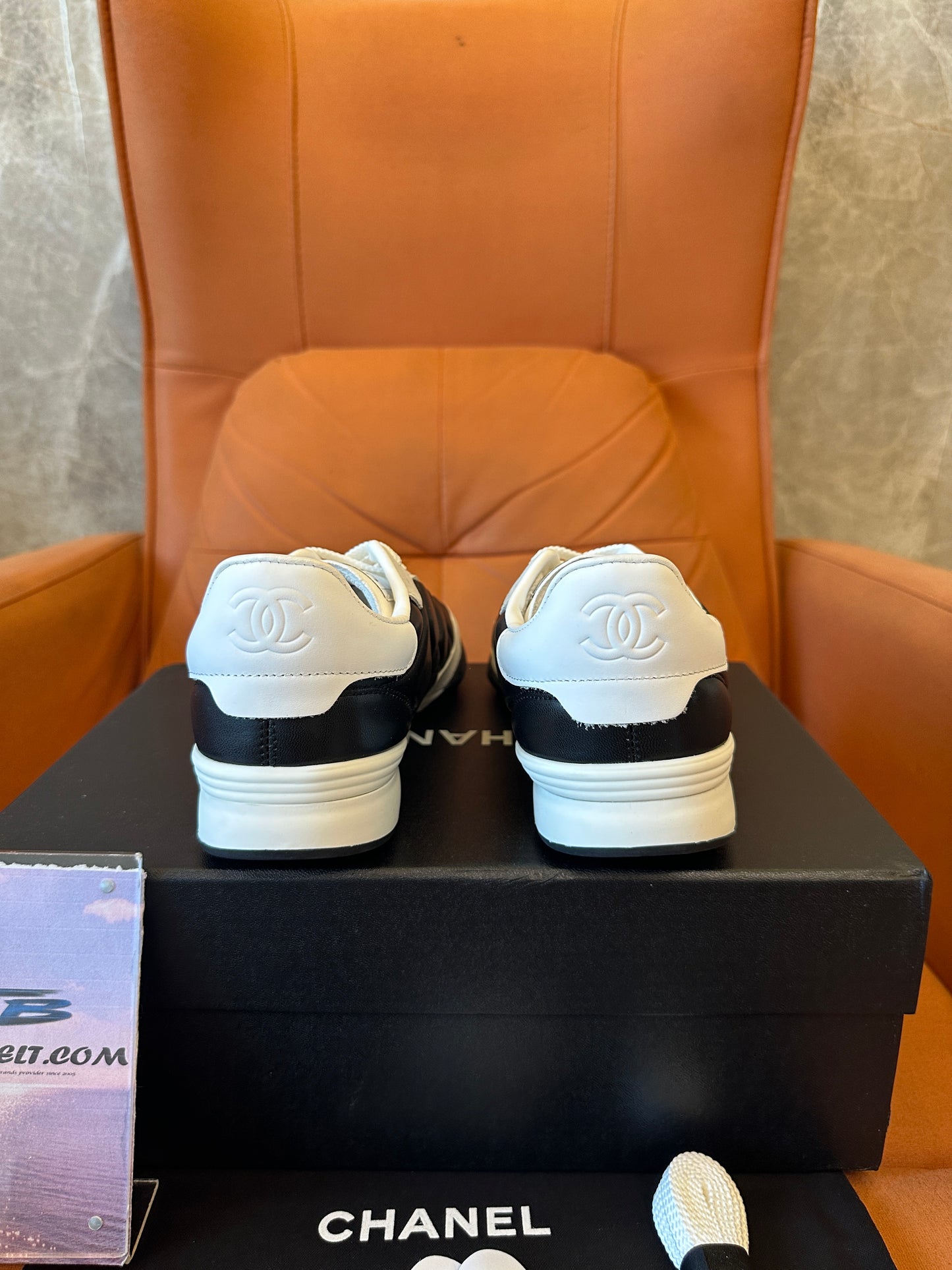 Chanel Quilted Black White Low Top Sneakers
