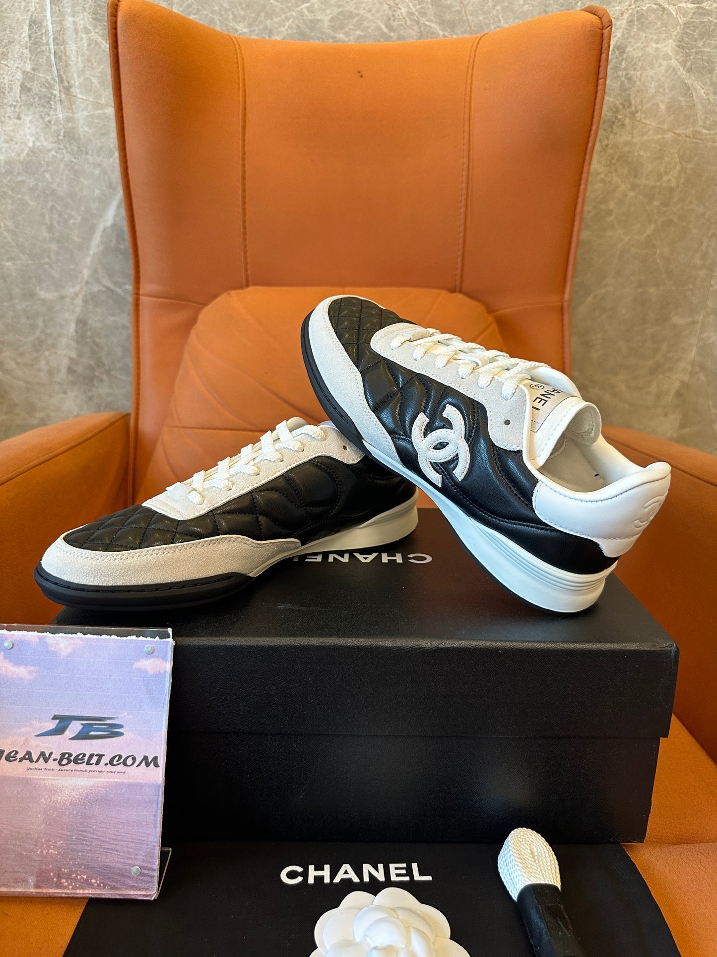 Chanel Quilted Black White Low Top Sneakers