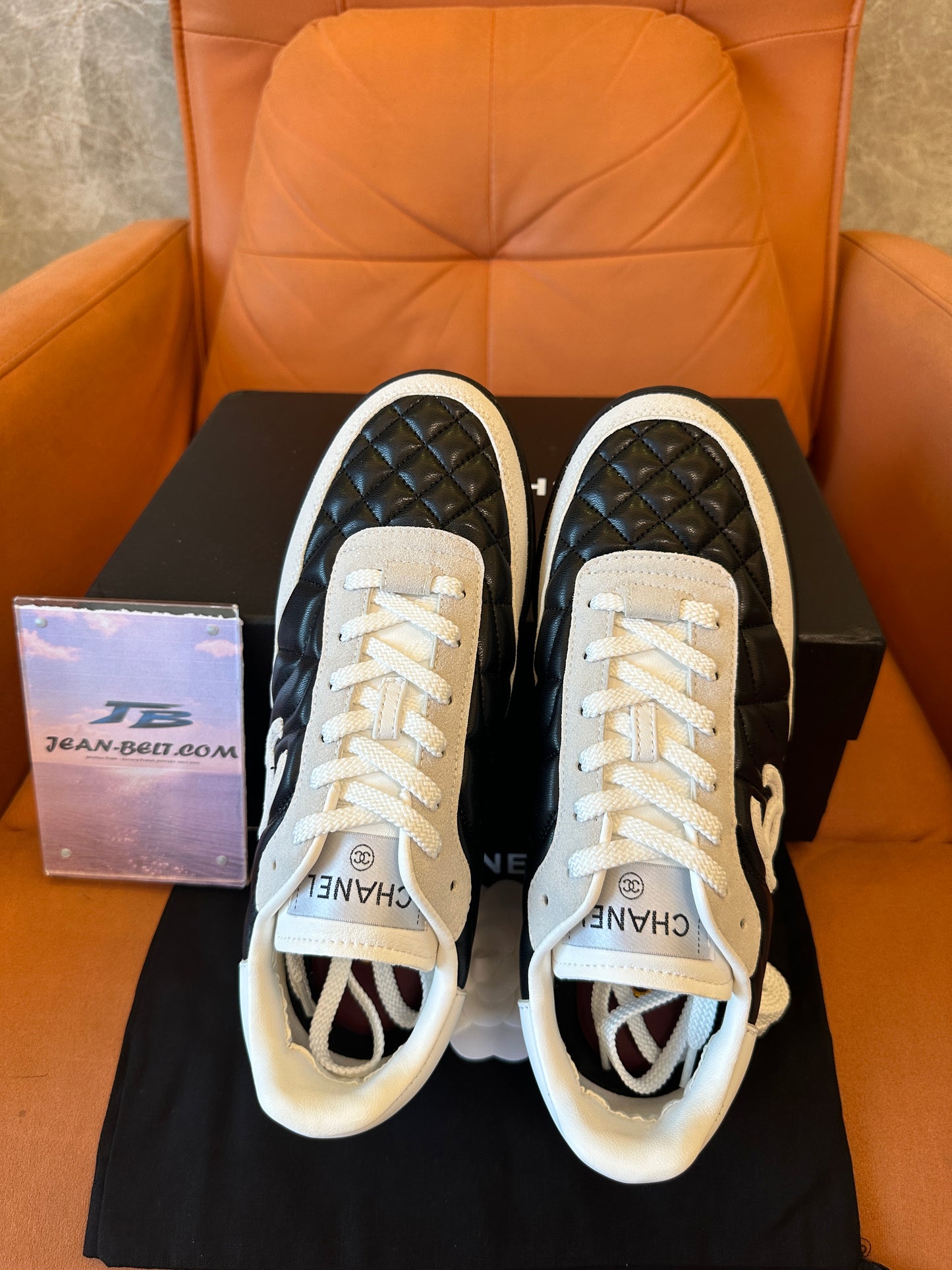 Chanel Quilted Black White Low Top Sneakers