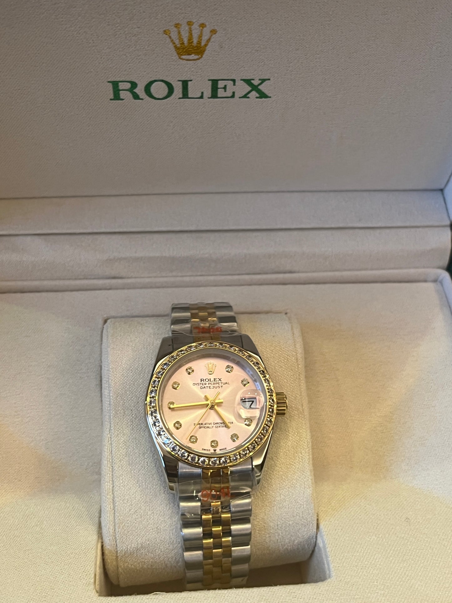 Rolex datejust 31 mm pink mother of pearl dial two tone diamond watch