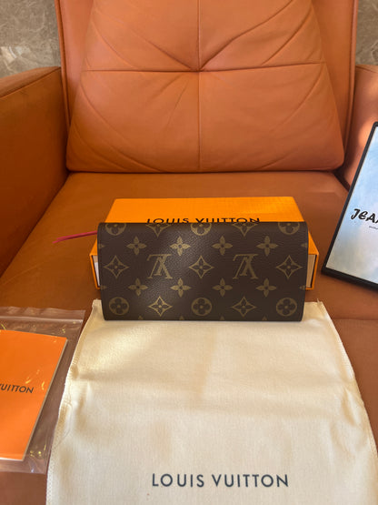 Carteira Louis Vuitton Emilie com monograma em tela rosa fúcsia