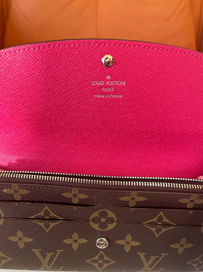 Carteira Louis Vuitton Emilie com monograma em tela rosa fúcsia