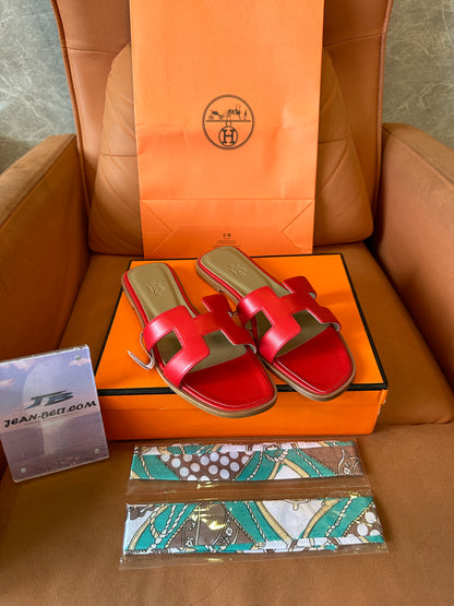 Hermès Oran Slippers in Red Calfskin Leather