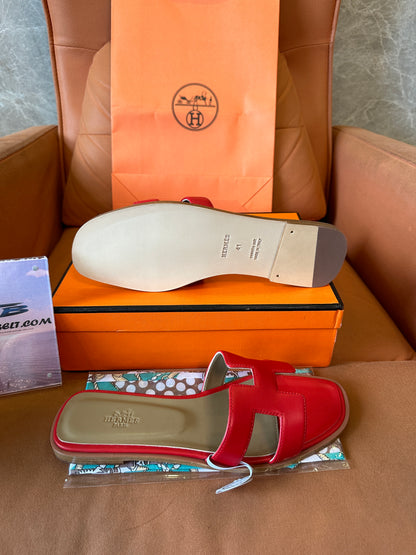 Hermès Oran Slippers in Red Calfskin Leather