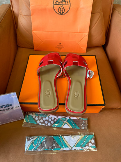 Hermès Oran Slippers in Red Calfskin Leather
