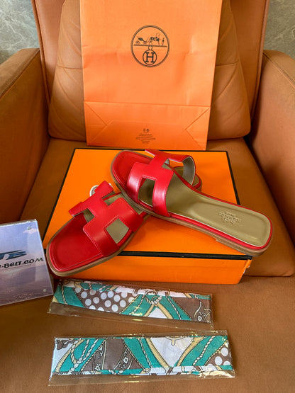 Hermès Oran Slippers in Red Calfskin Leather