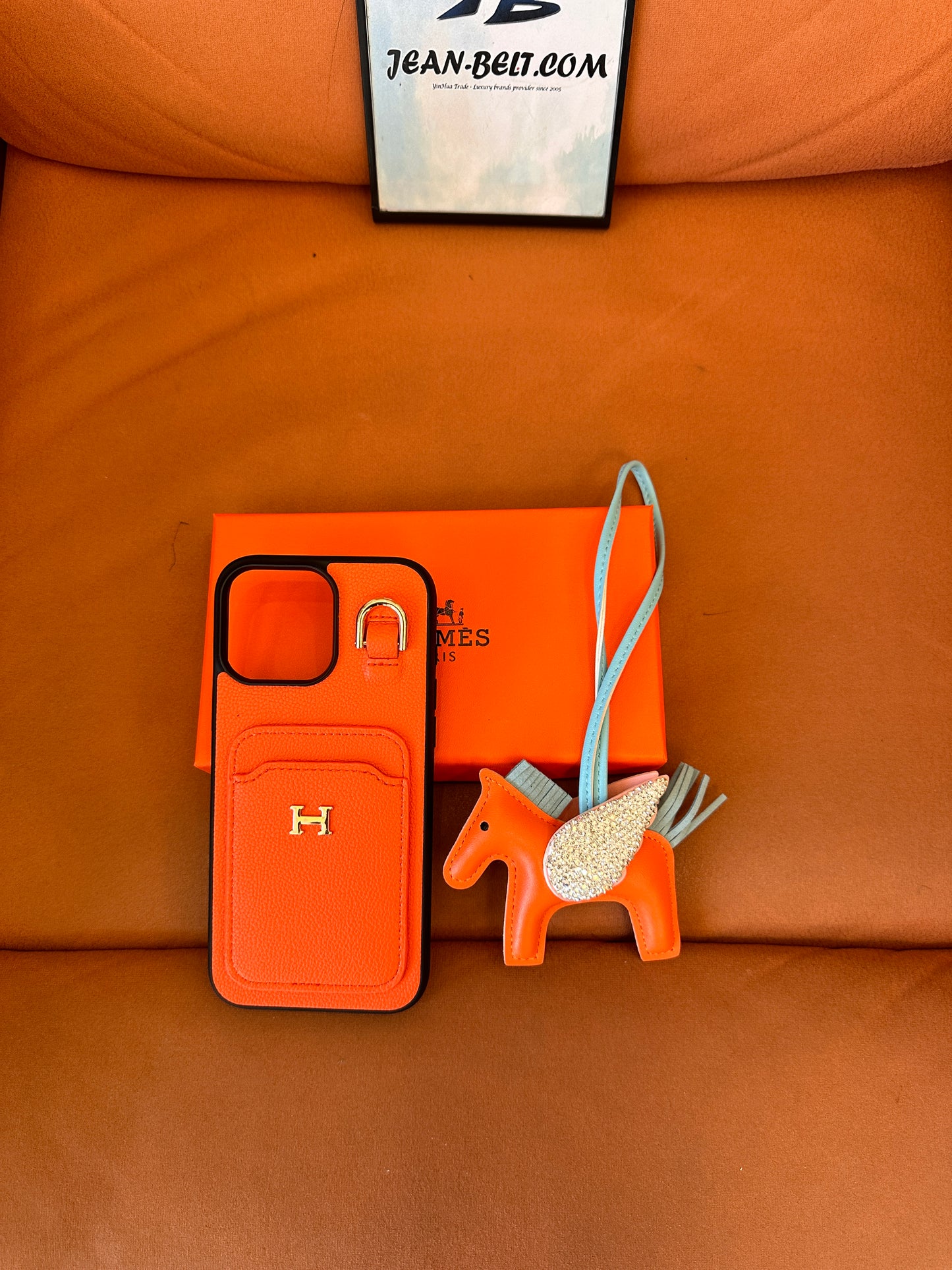 Hermès leather phone case with pouch, and pegasus charm