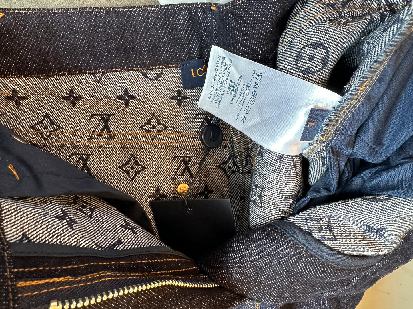Louis Vuitton Denim Jeans – Dark Wash with LV Logo Hem Detail