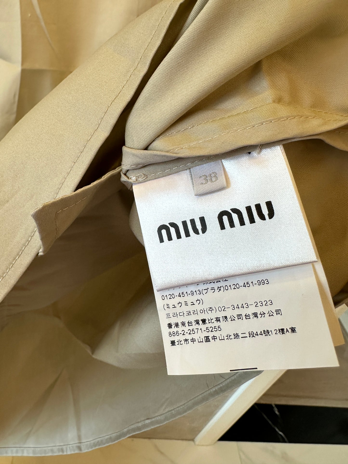 Miu Miu Sleeveless Polo Dress – Light Beige