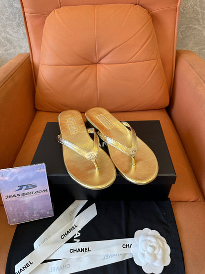 Chanel Gold Leather Logo Flip-Flop Sandals