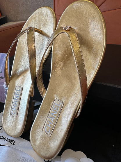 Chanel Gold Leather Logo Flip-Flop Sandals