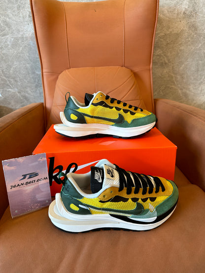 Nike x sacai VaporWaffle "Tour Yellow / Stadium Green" Mesh Suede Sneakers