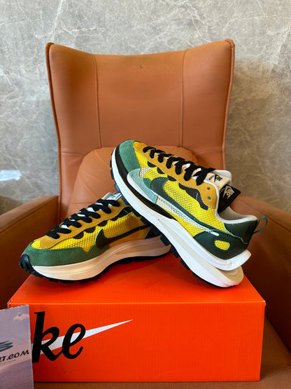 Nike x sacai VaporWaffle "Tour Yellow / Stadium Green" Mesh Suede Sneakers