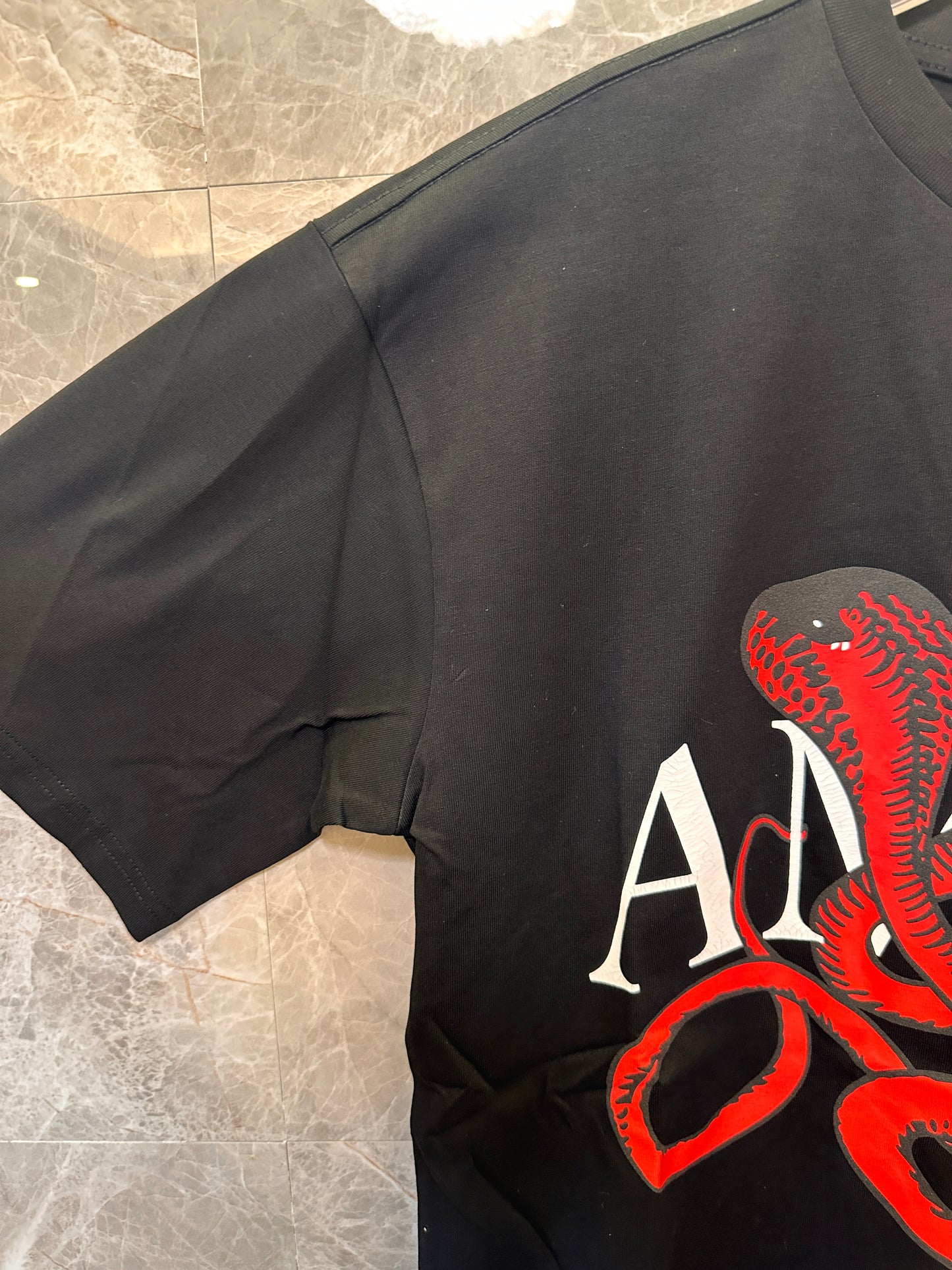Amiri Black T-shirt with Red Snake Graphic